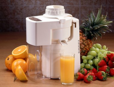 Juicer with glass and fruit clipart