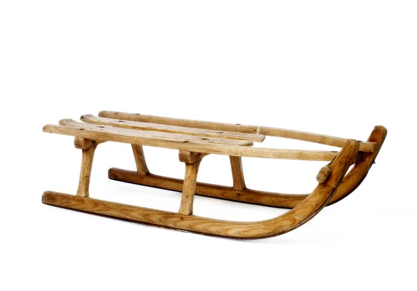 Old vintage wooden sled on white — Stock fotografie