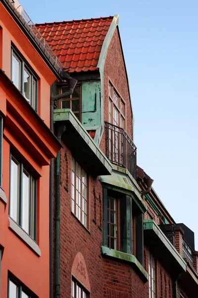 Brick building with balcony — Stock Photo, Image