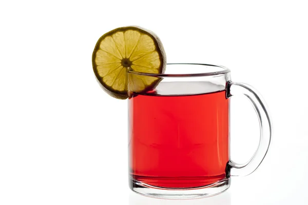 Bonita taza de té con una rodaja de limón — Foto de Stock