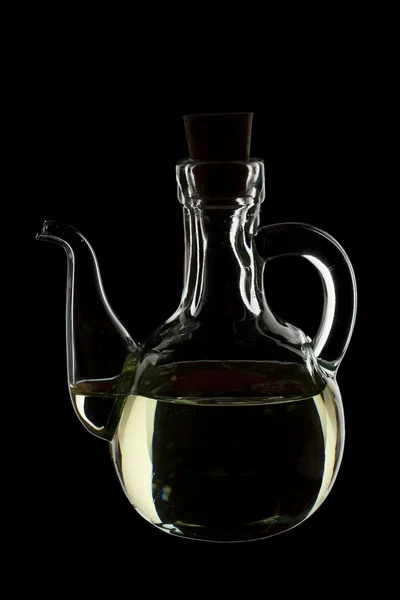 Olivenöl in einem transparenten Glas — Stockfoto