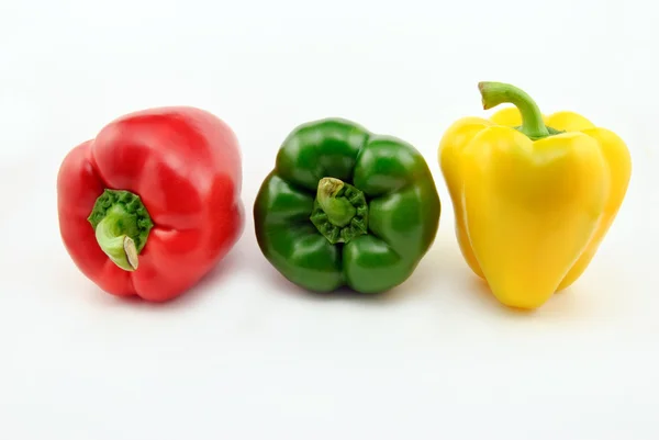 Red, green and yellow bell pepper (Capsicum annuum) — Stock Photo, Image
