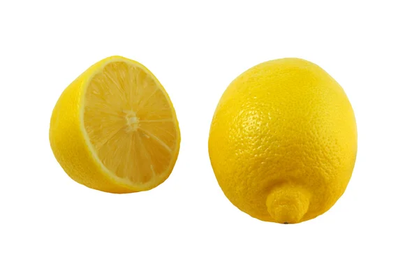 Egy egész citrom és egy fél (Citrus limon) - elszigetelt fehér background Jogdíjmentes Stock Képek