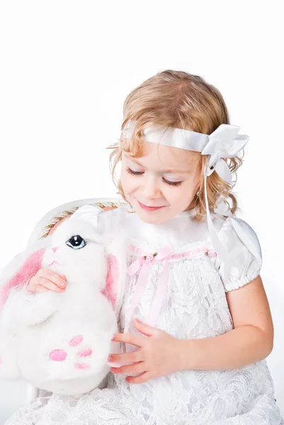 Cute girl with white rabbit — Stock Photo, Image