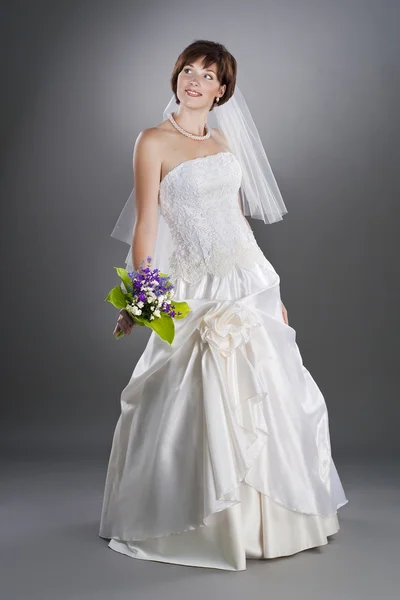 stock image Cheerful young pretty bride