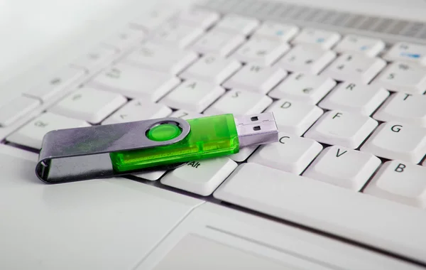 stock image Laptop and green usb memory stick