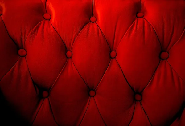 Rotes Retro-Sofa lizenzfreie Stockbilder