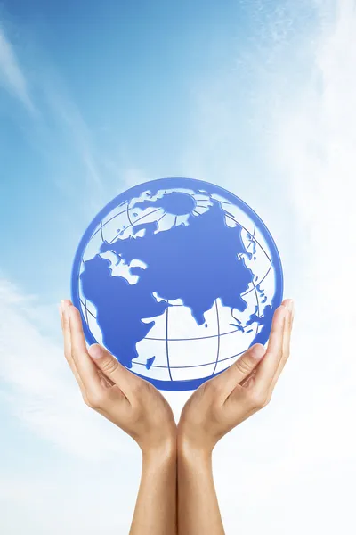 stock image Hands holding a blue earth