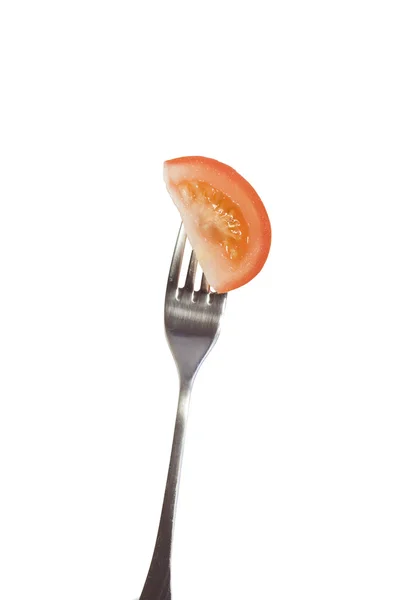 Tomate sobre tenedor aislado sobre blanco —  Fotos de Stock