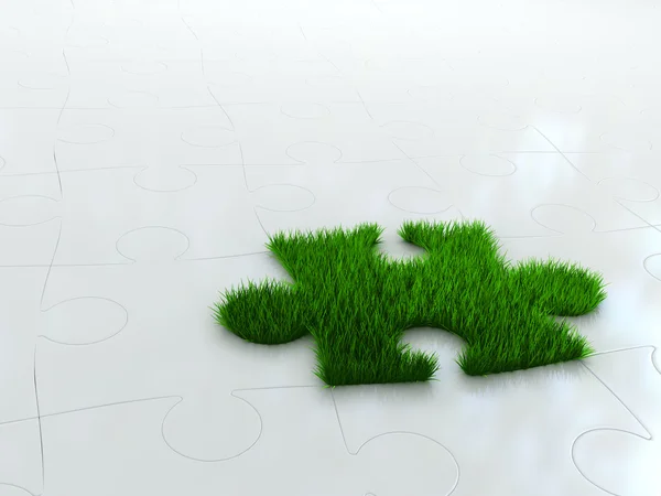 Jigsaw puzzle with green grass — Stock Photo, Image