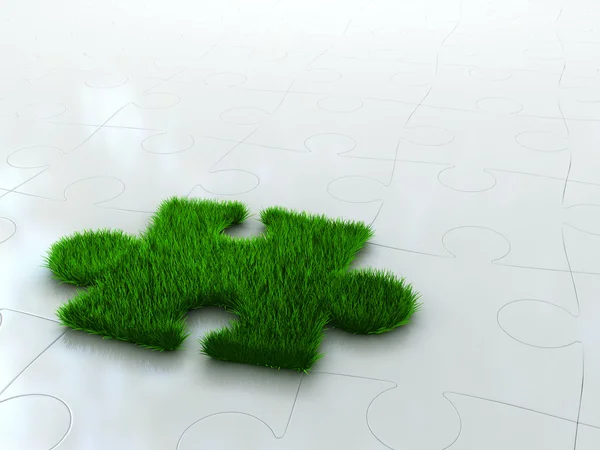 Jigsaw puzzle with green grass — Stock Photo, Image