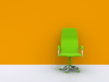 Green chair near orange wall