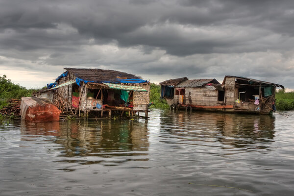 Floating Village on lake. Cambodia. Siem Reap. HDR processing.