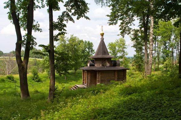 stock image The wooden orthodox church in the forest