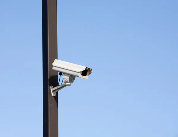 Surveillance Camera On Light Pole — Stock Photo © Markhayes #4280940