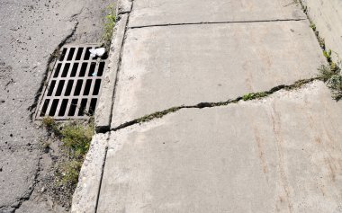 Cracked Urban Sidewalk clipart