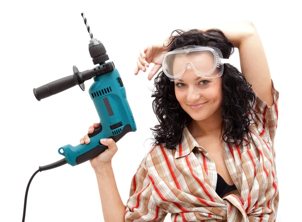 Girl with drilling machine — Stock Photo, Image