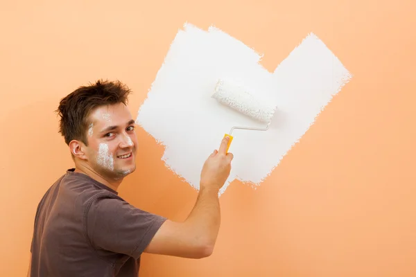 Homem pintando uma parede — Fotografia de Stock