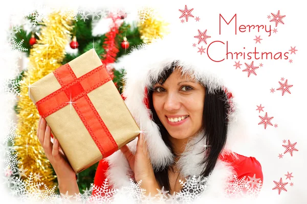 Kerstmis meisje met geschenk — Stockfoto