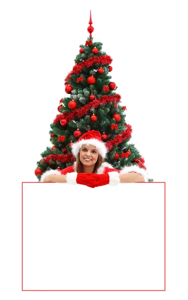 Sexy Mrs. Santa over a billboard — Stock Photo, Image