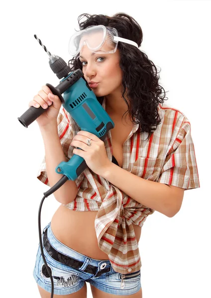 A young girl with drilling machine — Stock Photo, Image