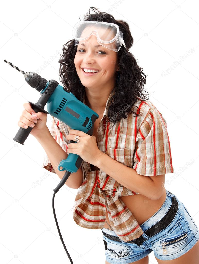 Girl with drilling machine