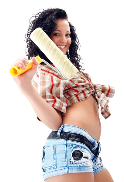 Sexy craftswoman with a roller brush — Stock Photo, Image