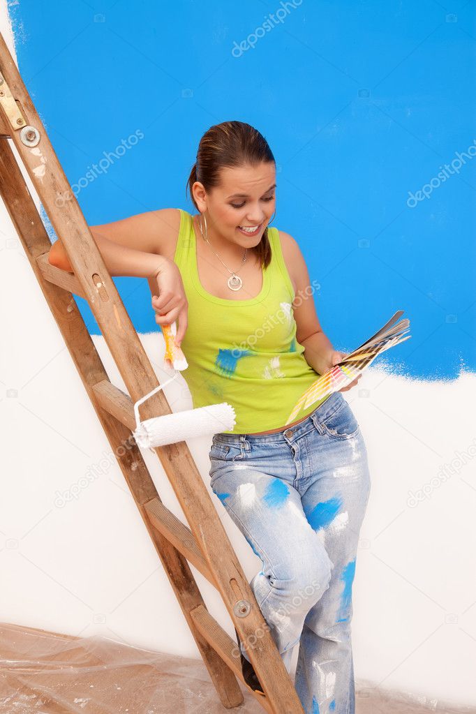 Woman looking at paint samples