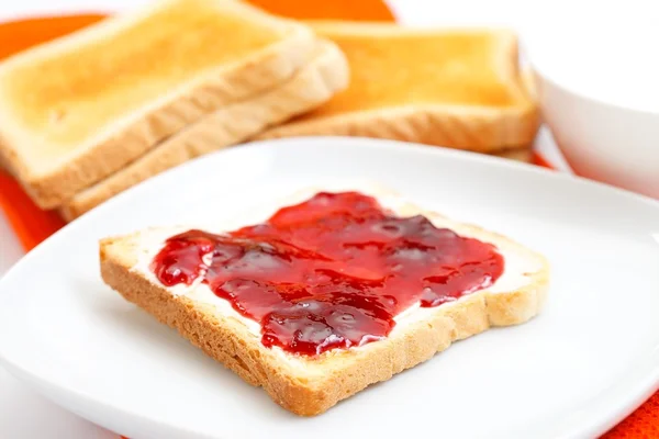 Toast bread with jam on a plate — Stock Photo, Image
