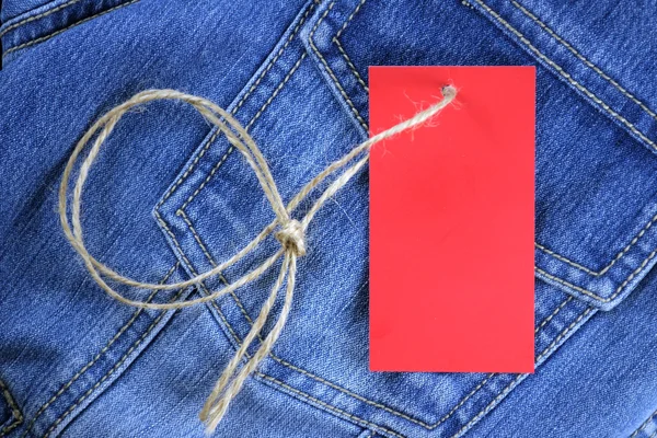 Precio Etiqueta Sobre Jeans Fondo Colocar Propio Texto Aquí —  Fotos de Stock