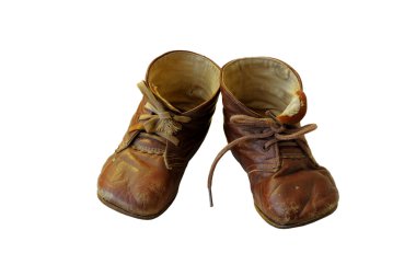 Pair of old and worn out shoes isolated on white background clipart