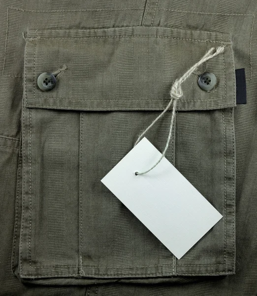 Weiße Leere Preisschild Über Texturierter Tasche — Stockfoto