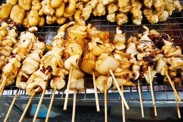 stock image Many of grilled squid in fresh market