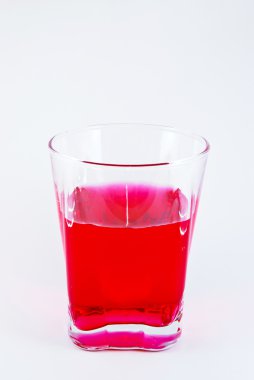 Glass of sweet red water for refreshment isolated clipart