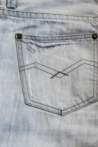 Šedé džíny zadní kapsy pozadí textury — Stock fotografie