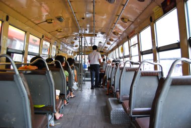 Inside a bus in Bangkok Thailand clipart