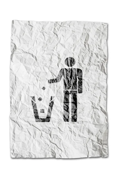 Person dumping recycle symbol on wrinkled paper isolated on whit — Stock Photo, Image