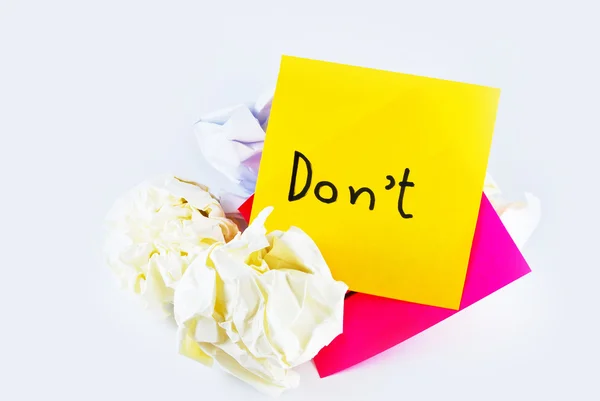 Wrinkled paper with note pad reminder "don't" isolated on wh — Stock Photo, Image