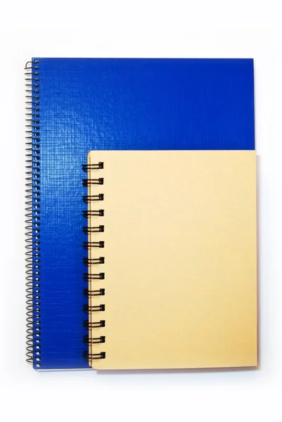 Caderno de capa azul e amarelo isolado — Fotografia de Stock