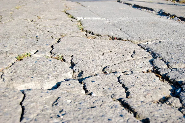 Cracked road flooring texture — Stock Photo, Image