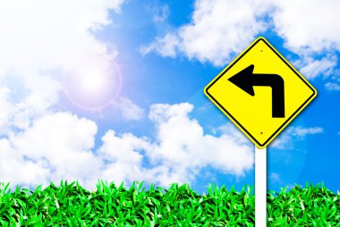 Turn left traffic sign on beautiful sky clipart