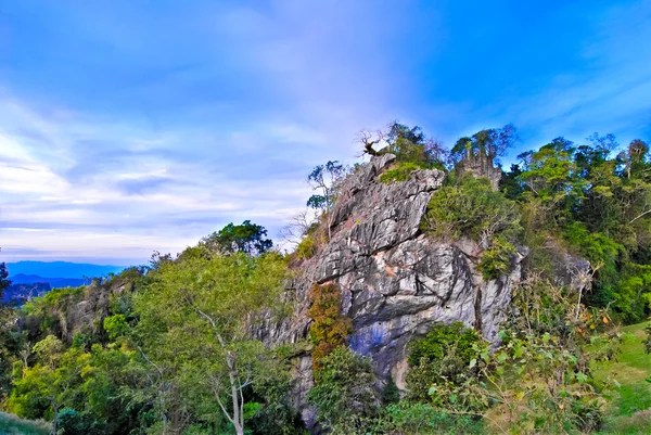 stock image Mountain cliff on blue sky