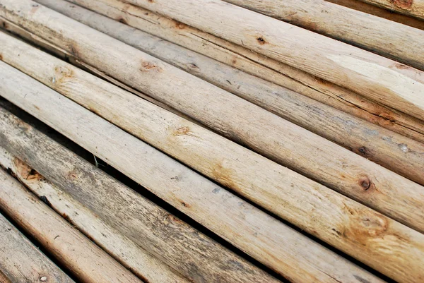 Pilha de madeira em troncos de armazenamento closeup — Fotografia de Stock