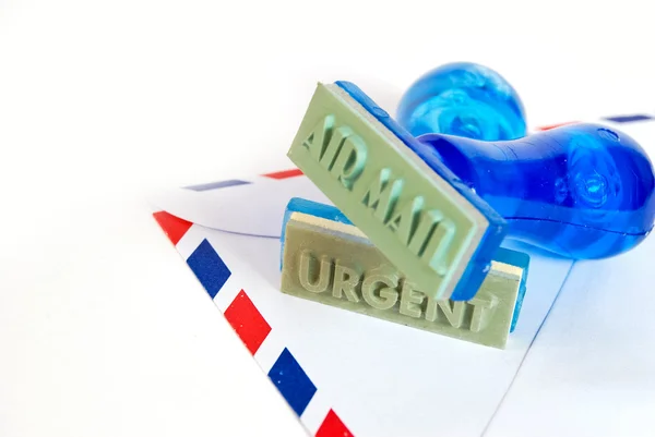 Urgent stamp on air mail — Stock Photo, Image