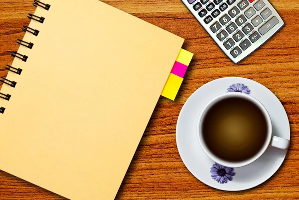White cup of coffee and notebook — Stock Photo, Image
