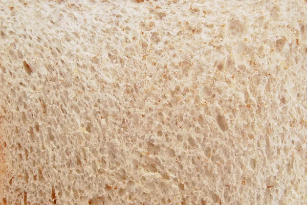 Textuur van gesneden hele tarwe brood — Stockfoto