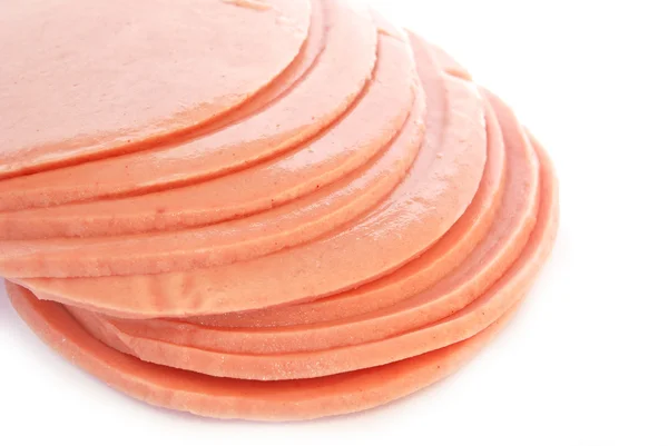 Sliced of bologna ham isolated — Zdjęcie stockowe
