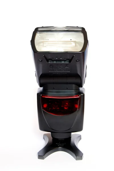 Aparat fotograficzny błysk speedlight na białym tle — Zdjęcie stockowe