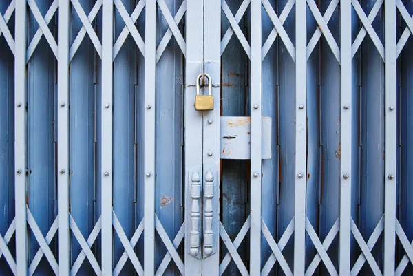 Vintage locked old metal door — Stock Photo, Image