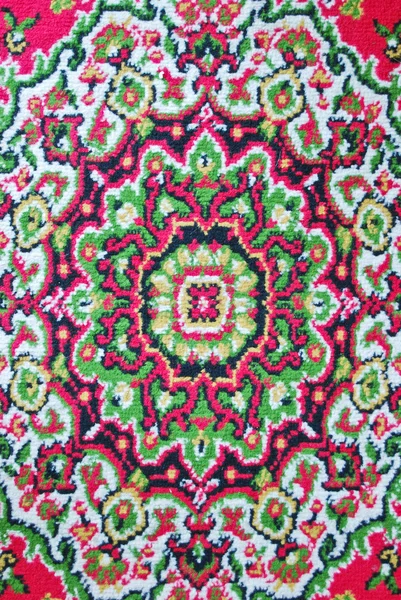 Batik fabric carpet with oriental pattern background — Stock Photo, Image